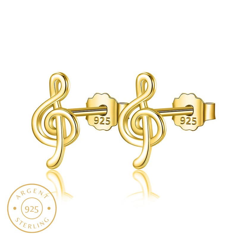 Boucle d'oreille homme clé de sol dorée