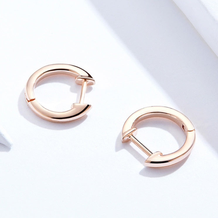 Boucle d'oreille doré rose homme