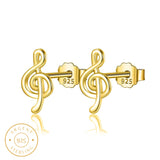 Boucle d'oreille homme clé de sol dorée