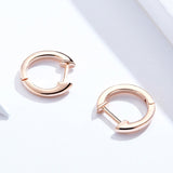 Boucle d'oreille doré rose homme
