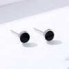 puces d'oreilles homme noir