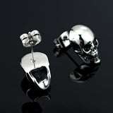 puces d'oreille homme crâne