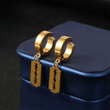 Fausses boucles d'oreilles dorées pendantes au style punk